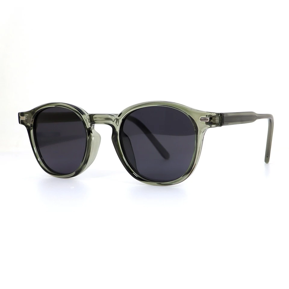 Three-quarter view of custom round acetate sunglasses with dark polarized lenses Three-quarter view of custom round acetate sunglasses with dark polarized lenses